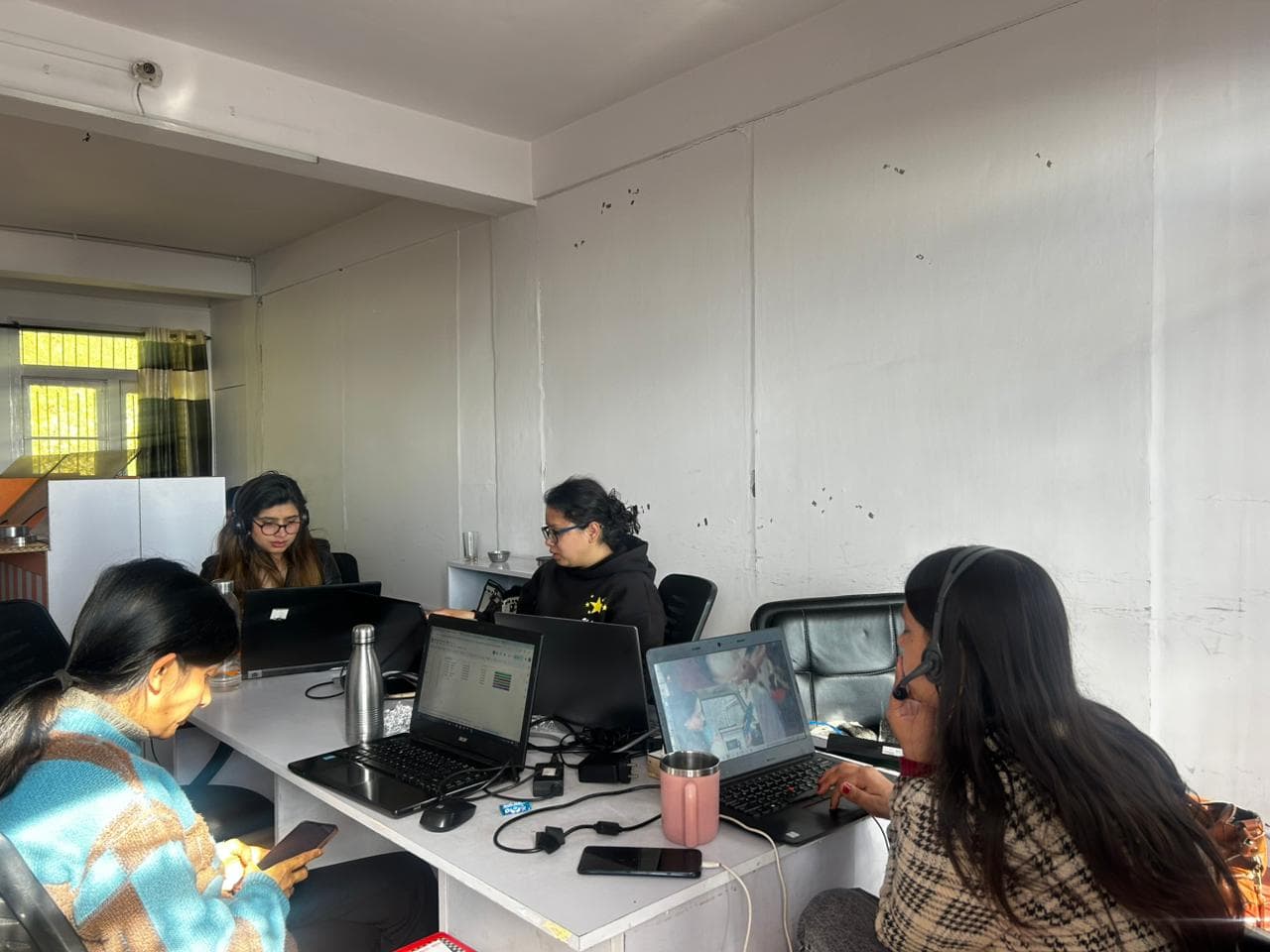 HighlandConnect agents working on customer support calls